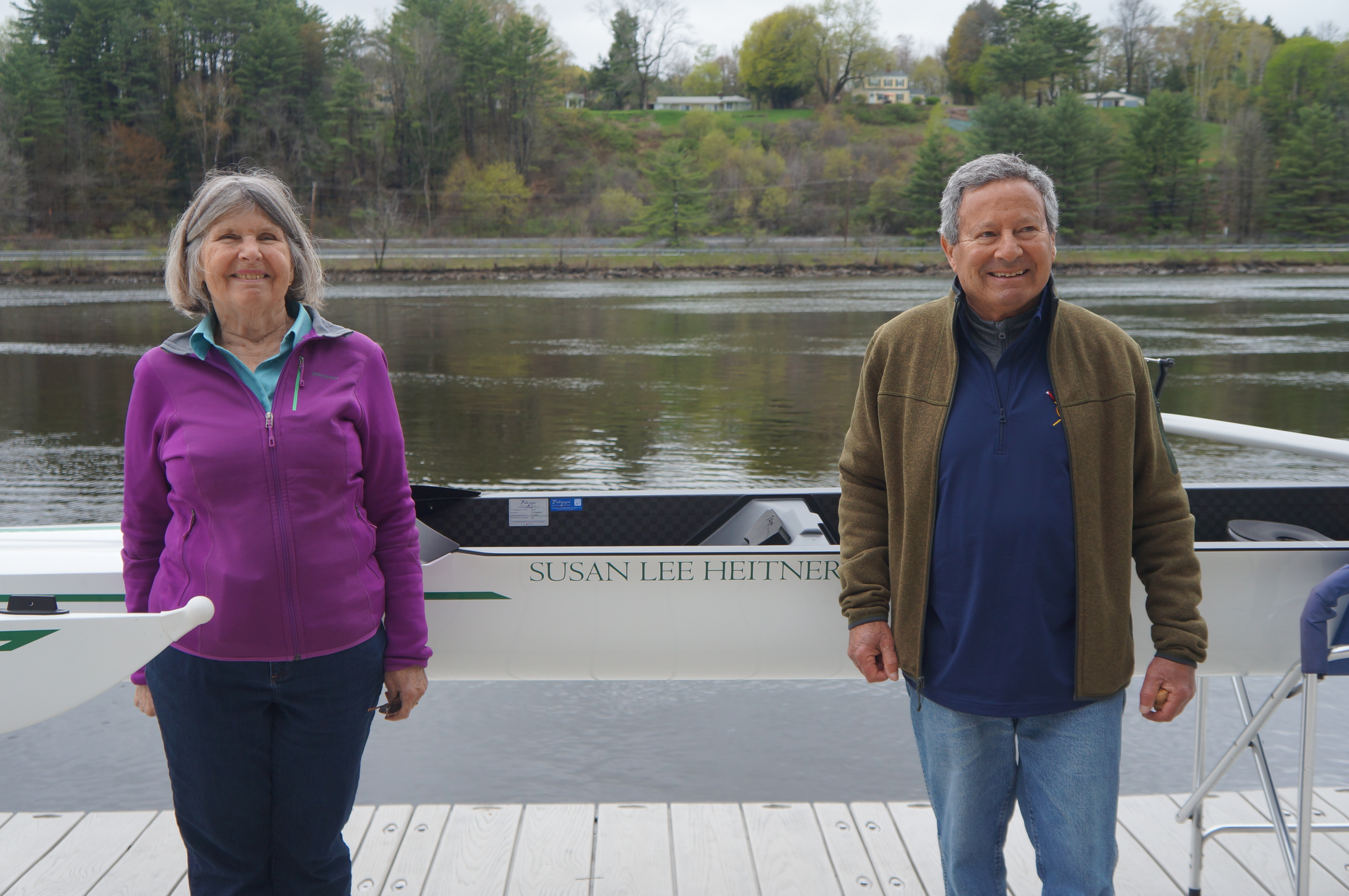 Susan and Michael Heitner stand with one of their boats.